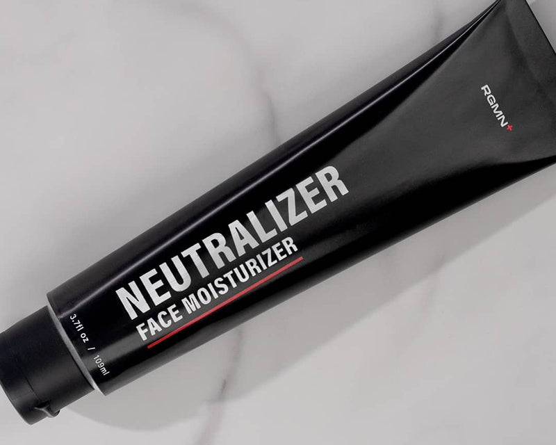 RGMN+ Neutralizer face moisturizer tube with a 100% Yuka rating card on a light gray background