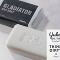 Thumbnail for RGMN+ Gladiator bar of soap and packaging on a white background.